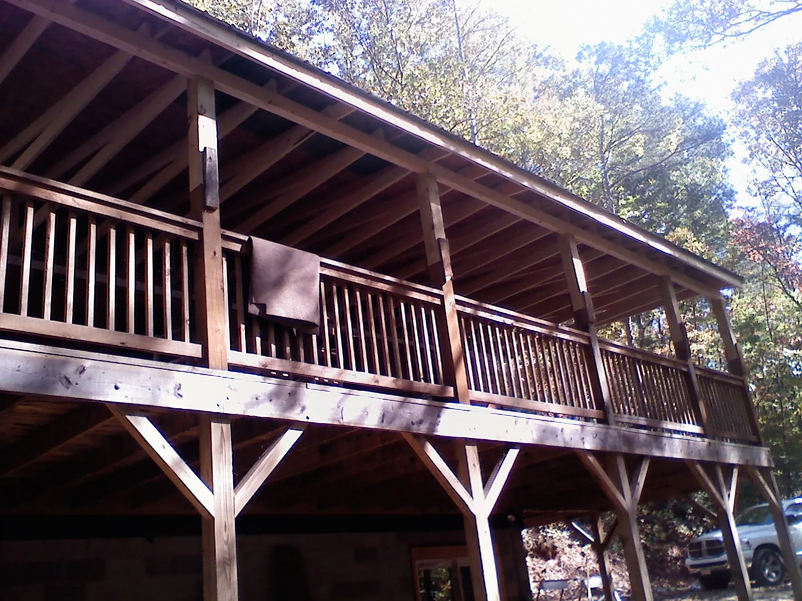 Timber framing under a new elevated porch and deck — Roof Leak Repair in San Tan Valley by Roofing Brothers